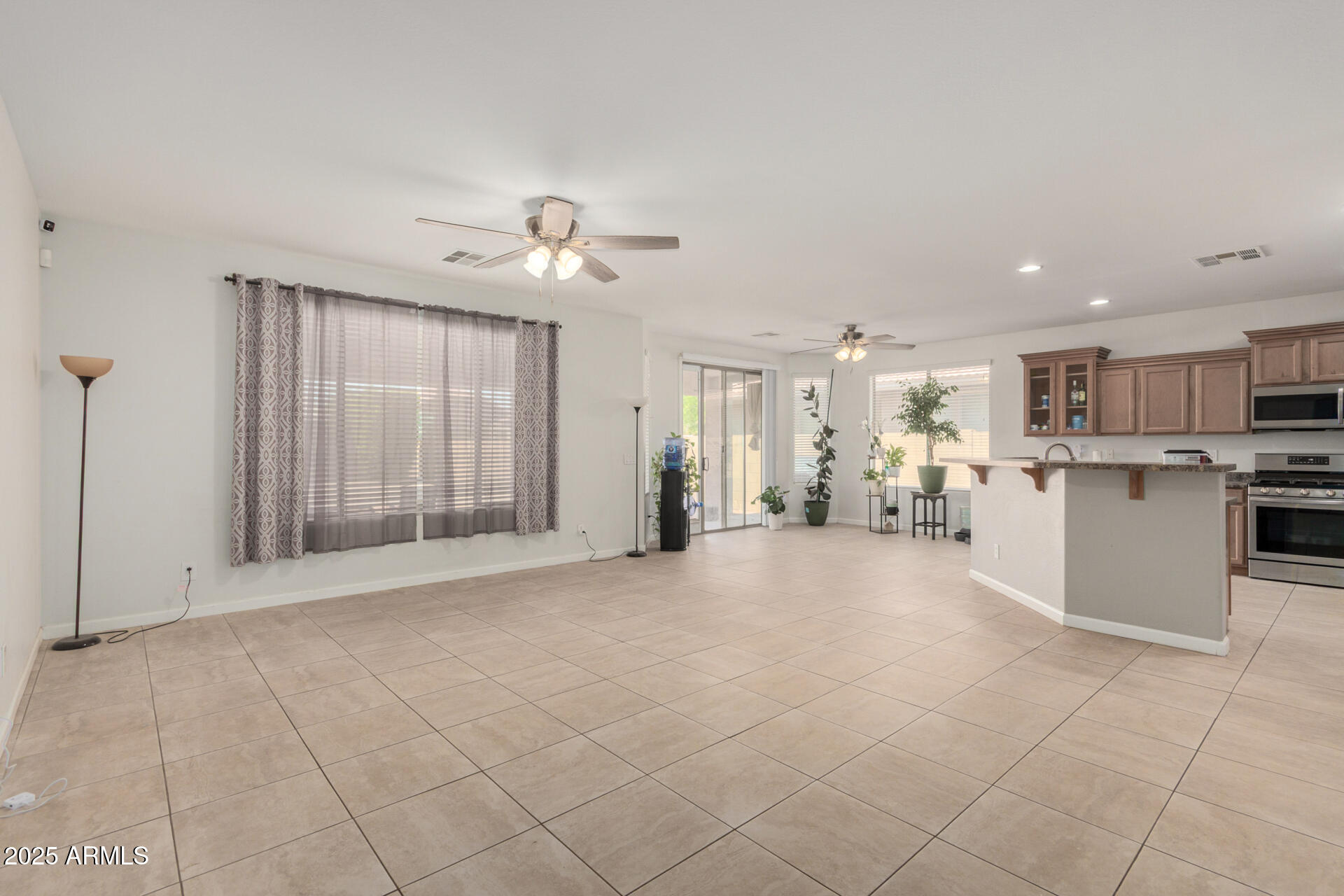 2413 West Beverly Rd. Phoenix, AZ 85041 - Photo 9 of 28 a view of a kitchen with a sink and a window