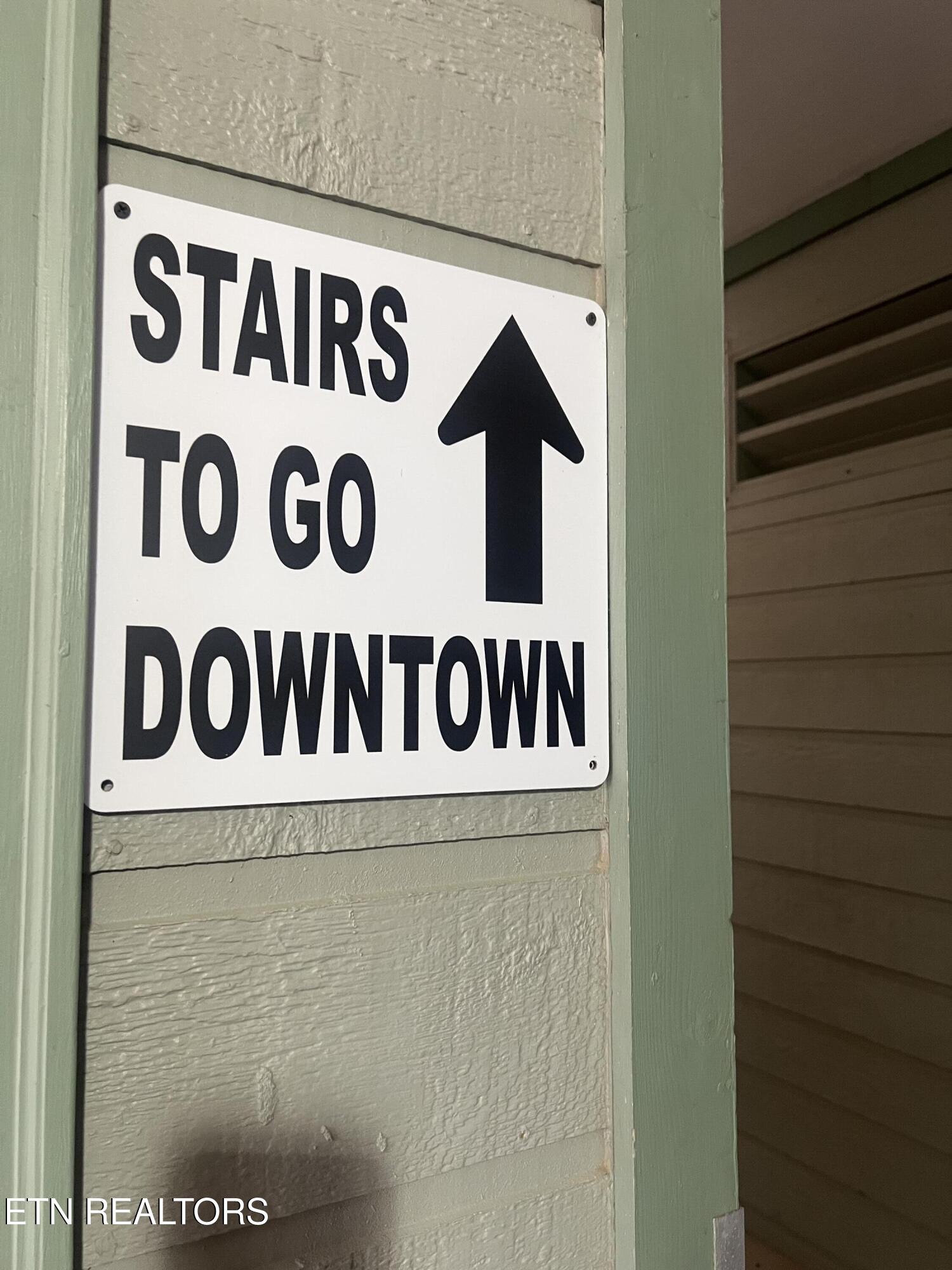 354 East Holly Ridge Road, Unit 202 Gatlinburg, TN 37738 - Photo 17 of 22 Stairs sign