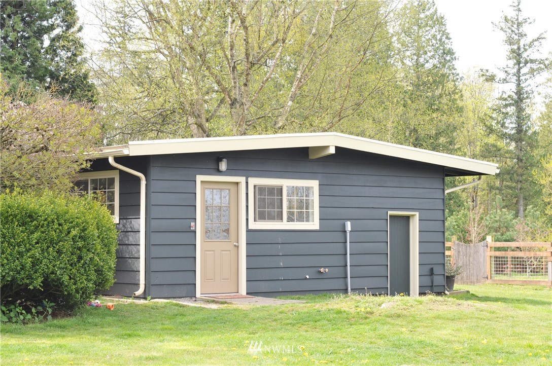 3879 Brown Road Ferndale, WA 98248 - Photo 23 of 36 a view of a house with a backyard