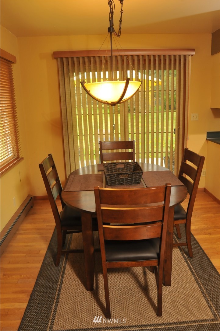 3879 Brown Road Ferndale, WA 98248 - Photo 8 of 36 a view of a dining room with furniture and a window