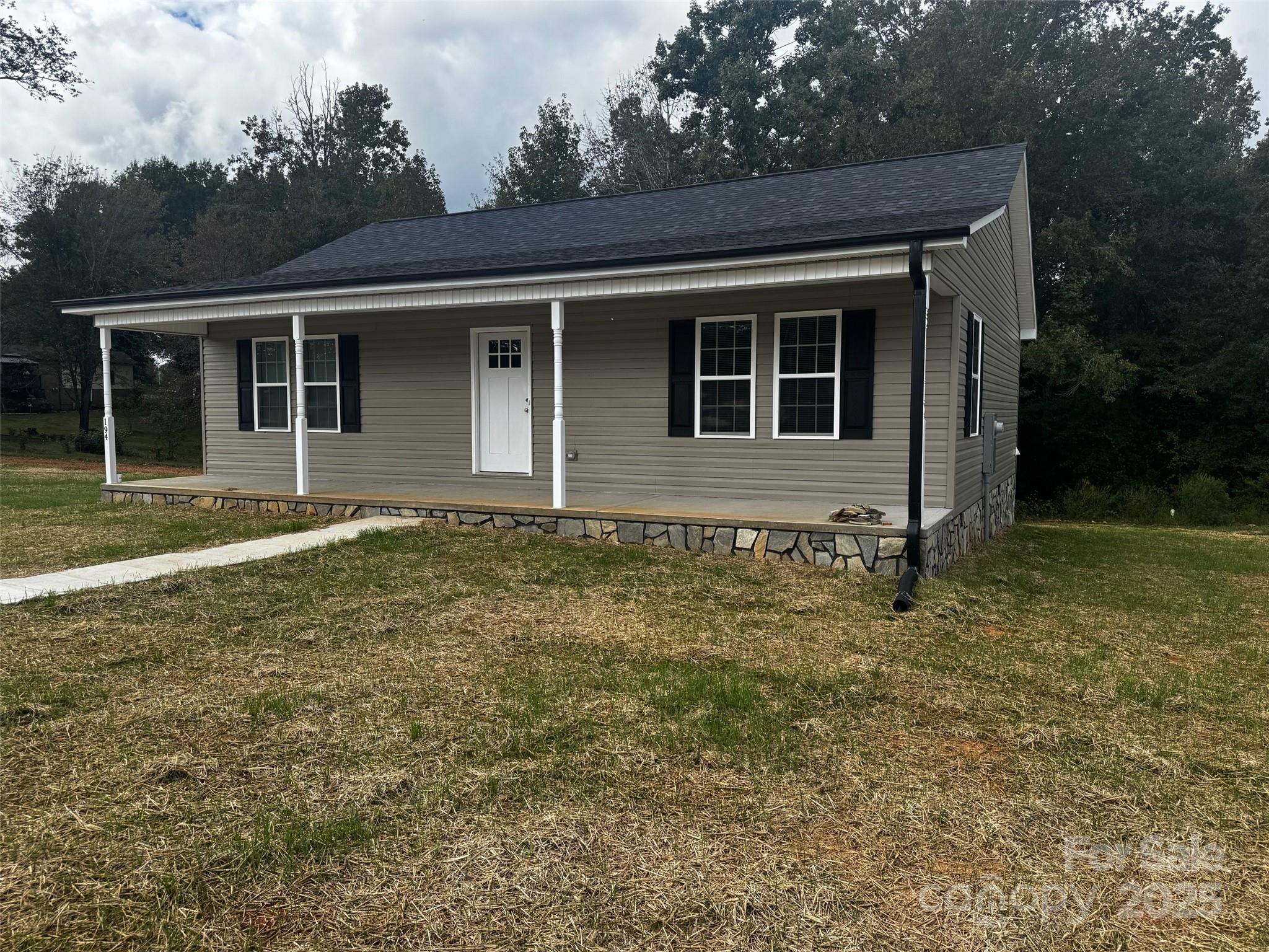 front view of house with a yard