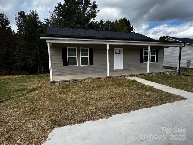 front view of house with a yard