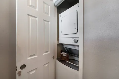 a close view of a utility room with washer and dryer