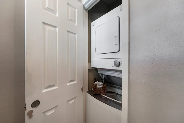 a close view of a utility room with washer and dryer