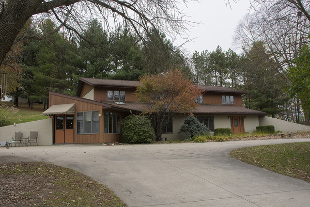 16380 Browns Road Morrison, IL 61270 - Photo 1 of 41 a front view of a house with a yard and garage