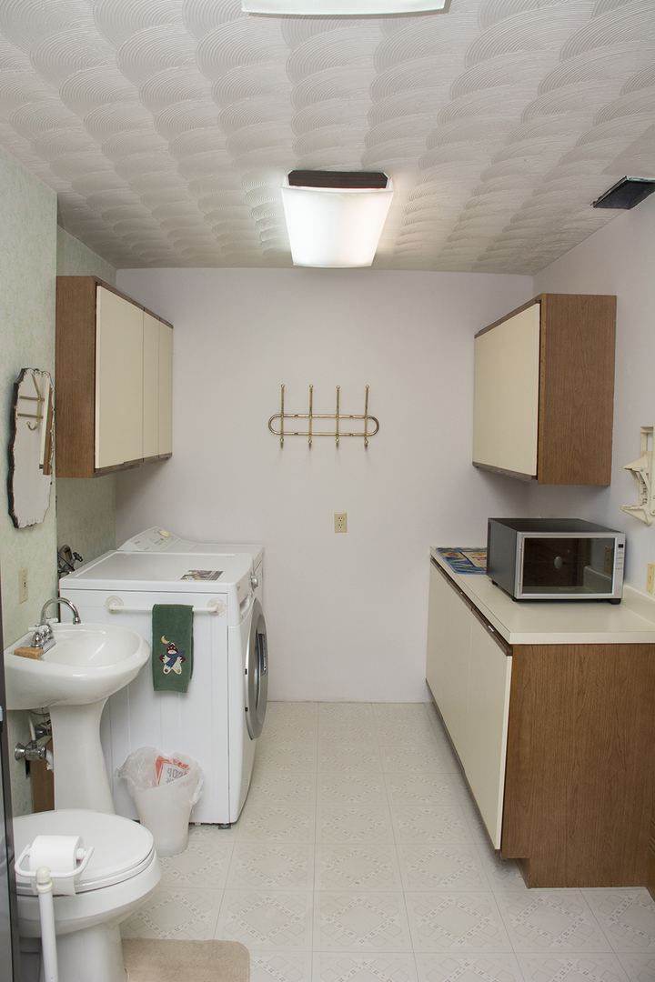 16380 Browns Road Morrison, IL 61270 - Photo 17 of 41 a bathroom with a sink a toilet and mirror