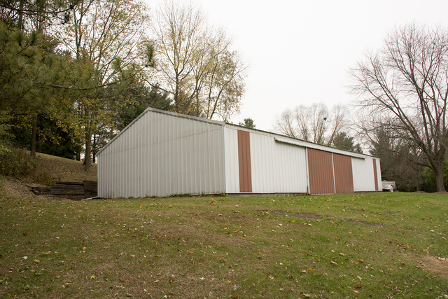 16380 Browns Road Morrison, IL 61270 - Photo 38 of 41 a view of a white house with a yard