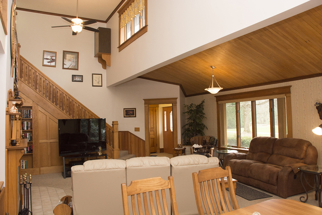 16380 Browns Road Morrison, IL 61270 - Photo 8 of 41 a living room with furniture a flat screen tv and a large window