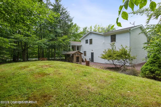a house view with a garden space