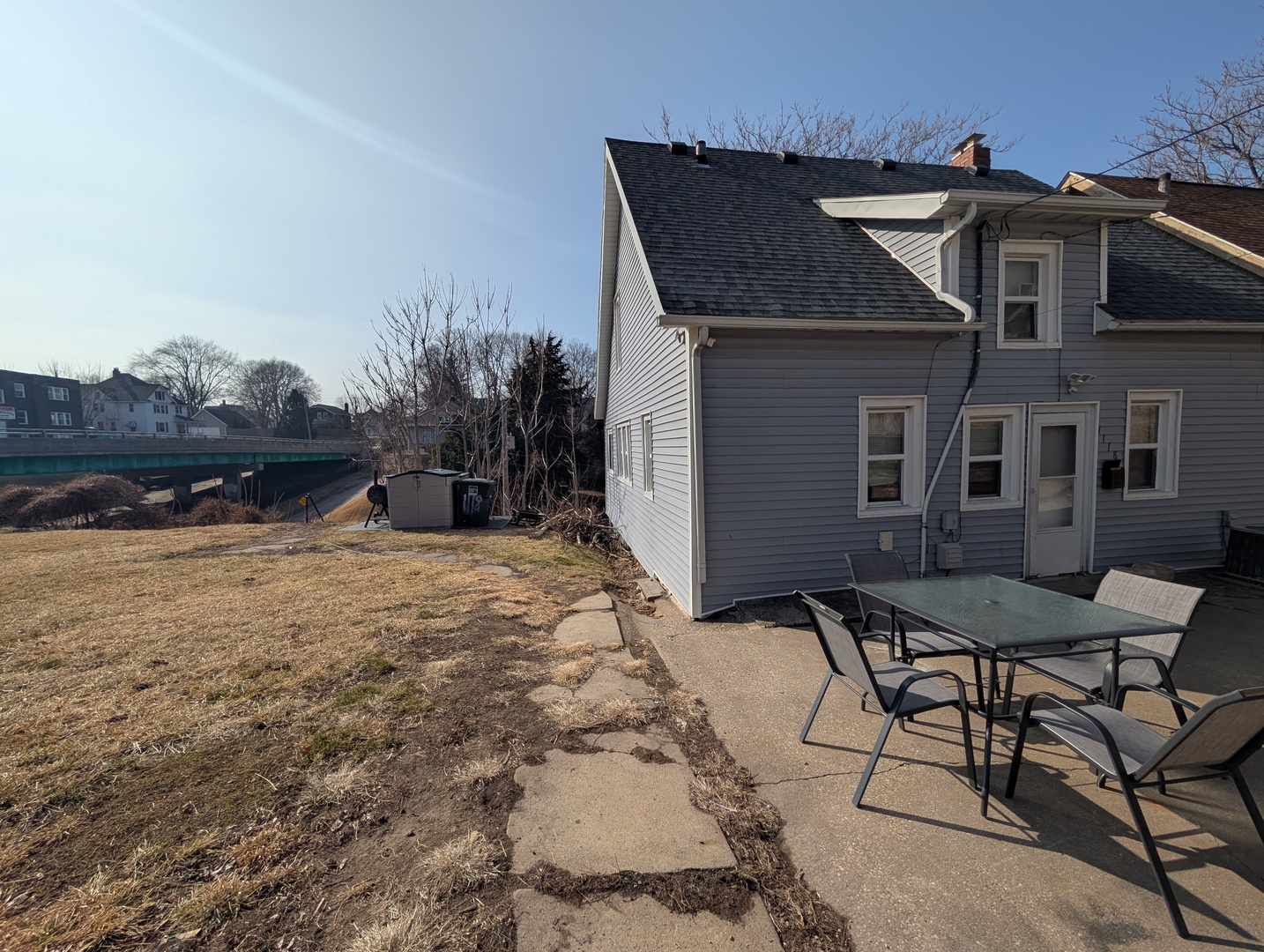 1118 15th Street Moline, IL 61265 - Photo 2 of 11 a view of a dinning table and chairs in patio