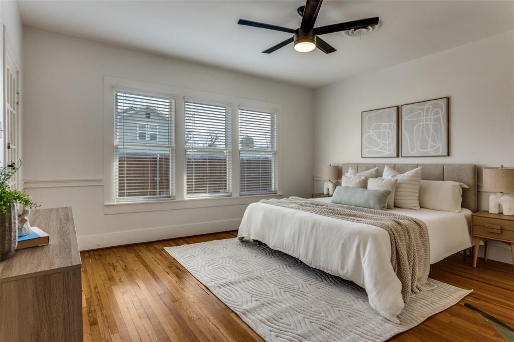 4601 Pershing Avenue Fort Worth, TX 76107 - Photo 13 of 28 a bedroom with a large bed and a window