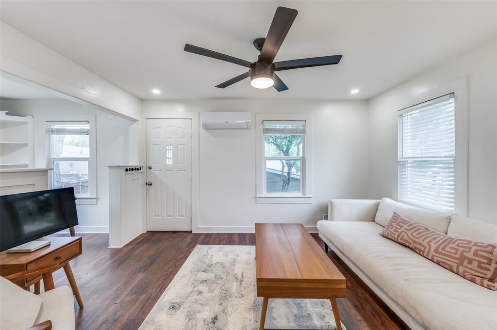 4601 Pershing Avenue Fort Worth, TX 76107 - Photo 21 of 28 a living room with furniture and a flat screen tv