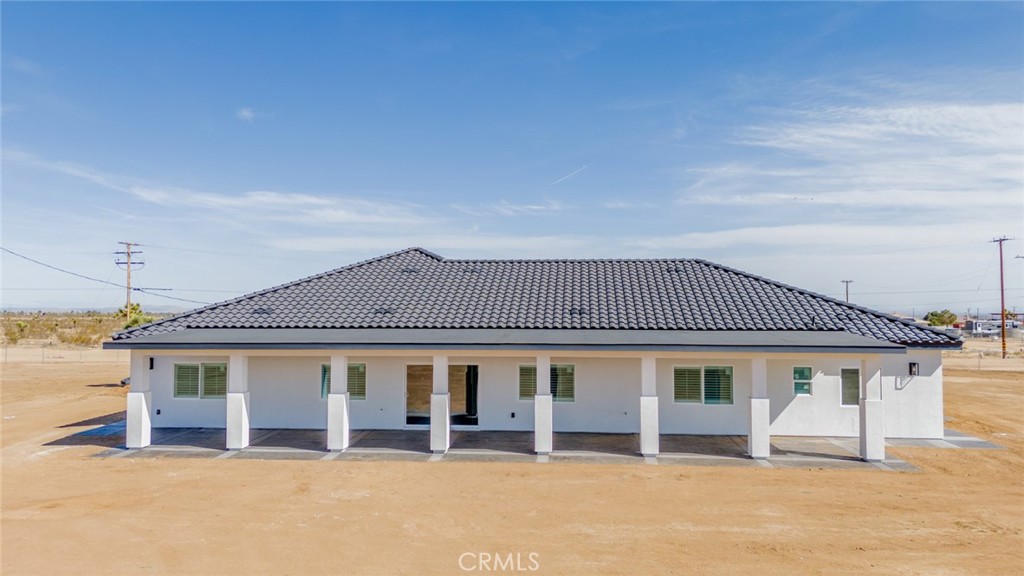 6873 Nyack Road Phelan, CA 92371 - Photo 52 of 56 a front door view of a house