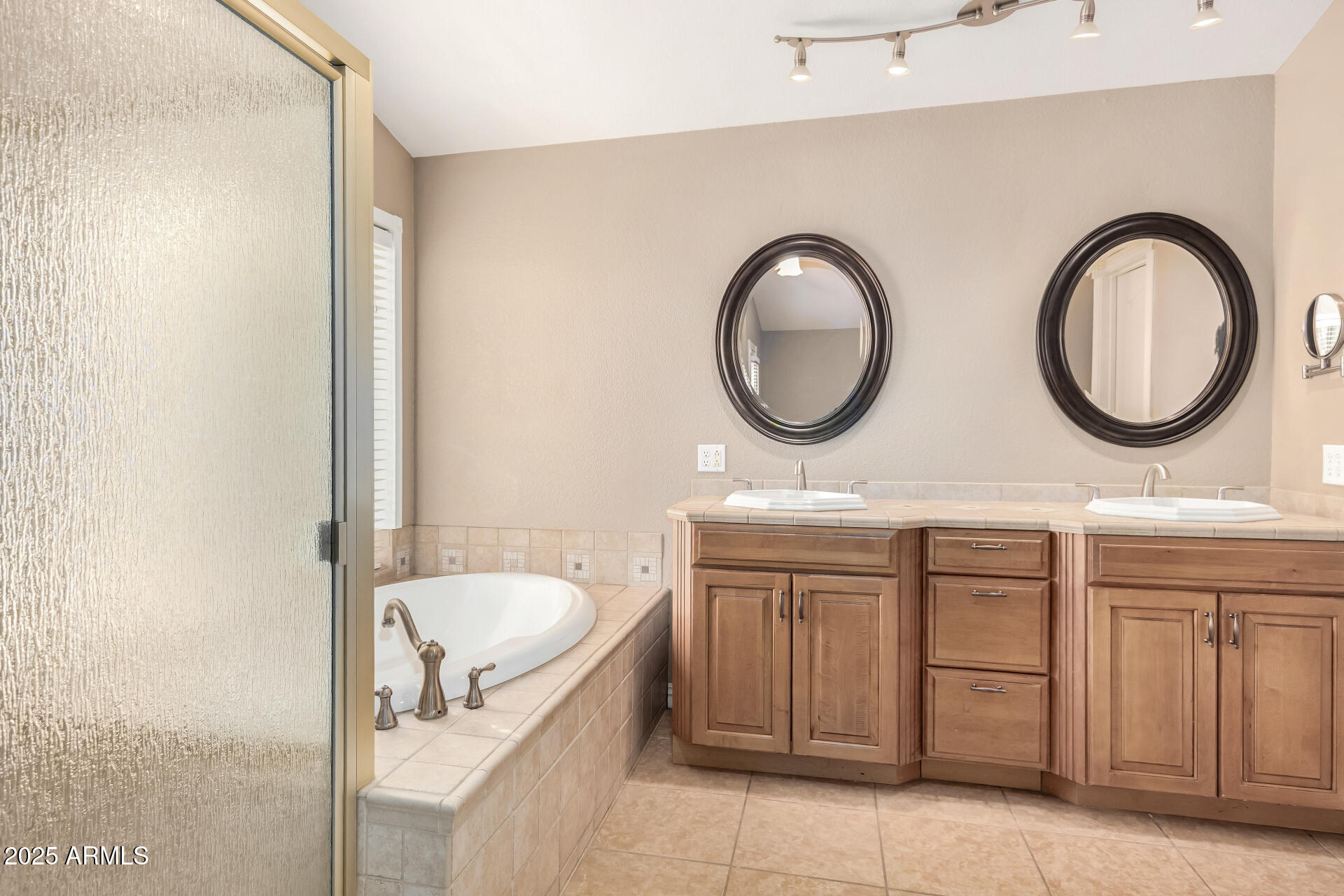 3013 East Bighorn Avenue Phoenix, AZ 85048 - Photo 15 of 40 a bathroom with a granite countertop sink and a mirror
