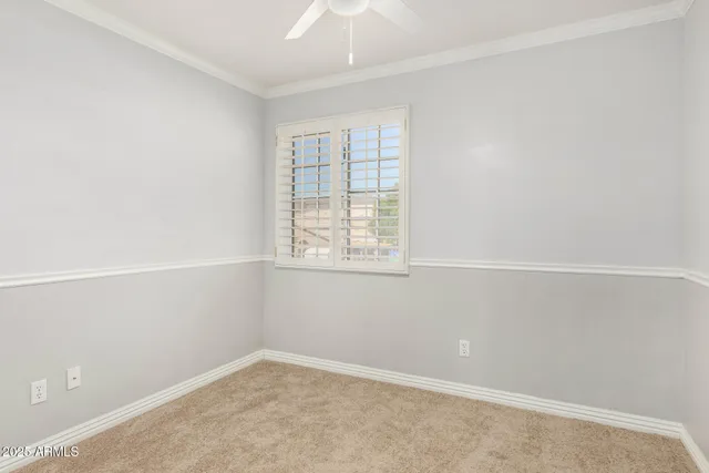 an empty room with closet area