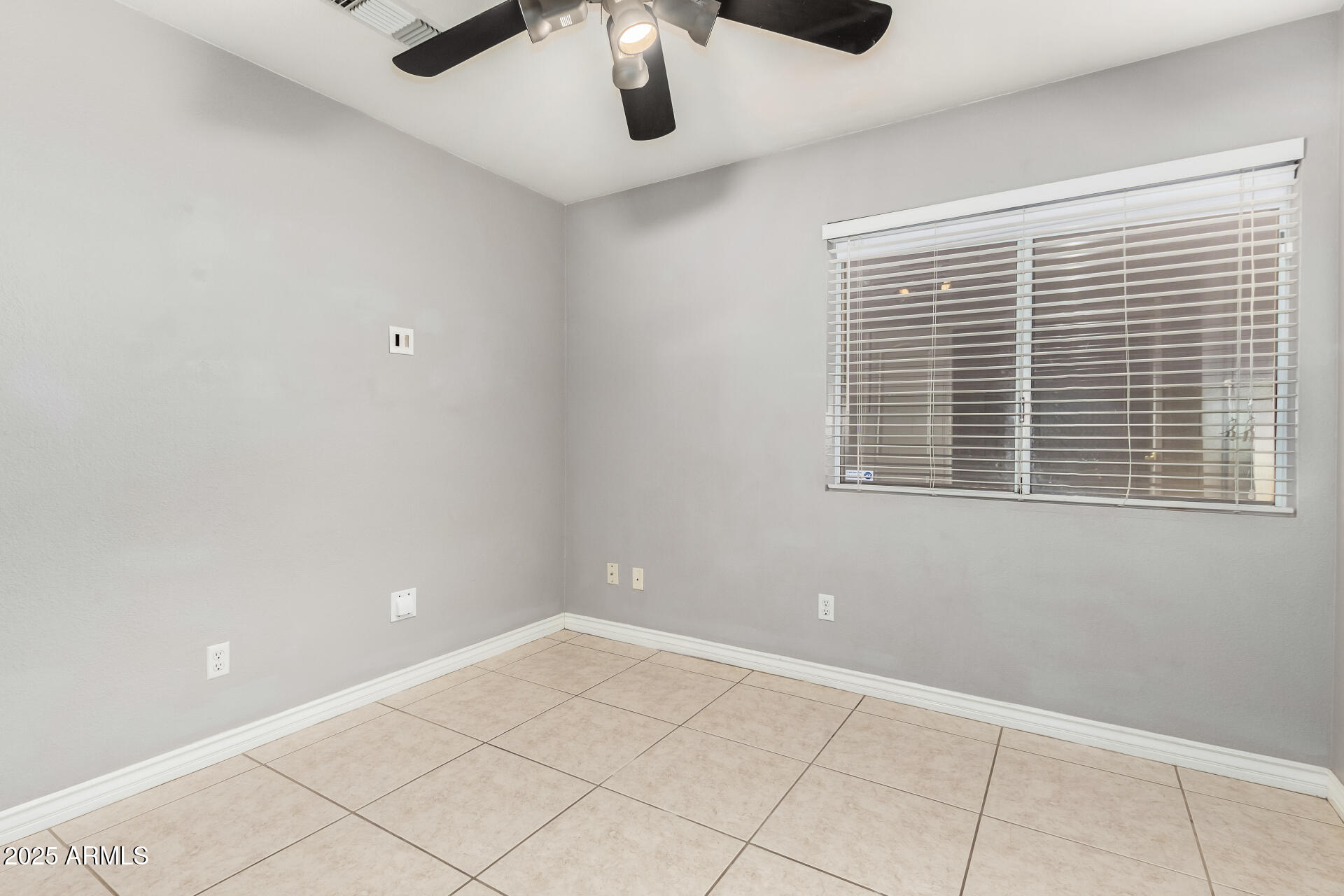 3013 East Bighorn Avenue Phoenix, AZ 85048 - Photo 25 of 40 a view of an empty room with a window