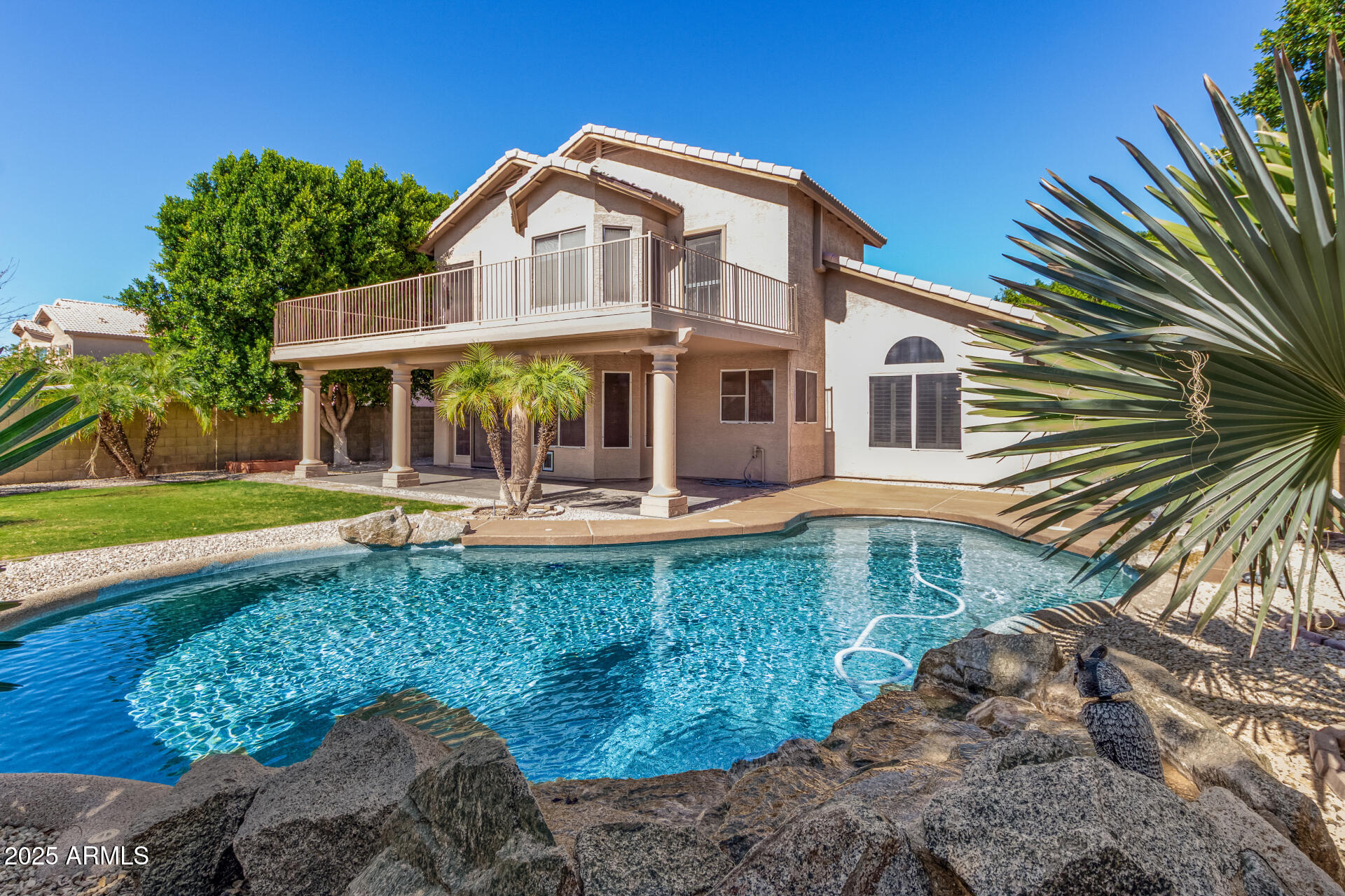 3013 East Bighorn Avenue Phoenix, AZ 85048 - Photo 32 of 40 a front view of a house with garden