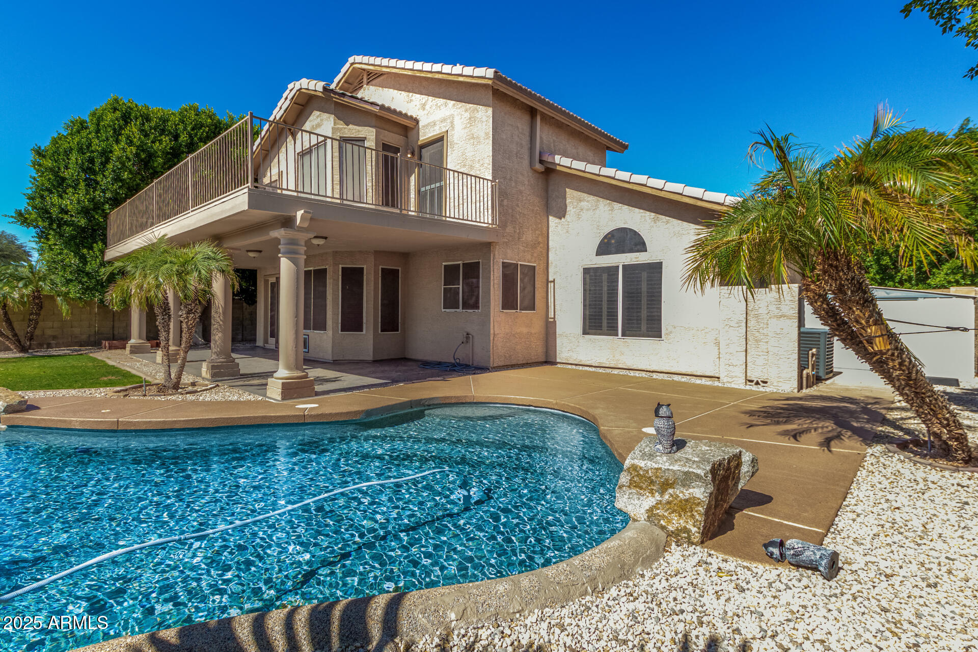 3013 East Bighorn Avenue Phoenix, AZ 85048 - Photo 36 of 40 a front view of a house with swimming pool