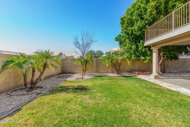 a view of a back yard of the house