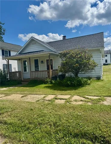 a view of a house with a garden