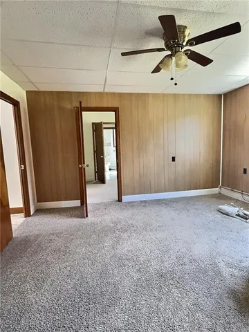 a view of a livingroom with a ceiling fan