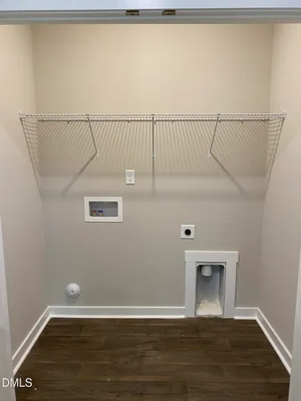 a view of small space with wooden floor