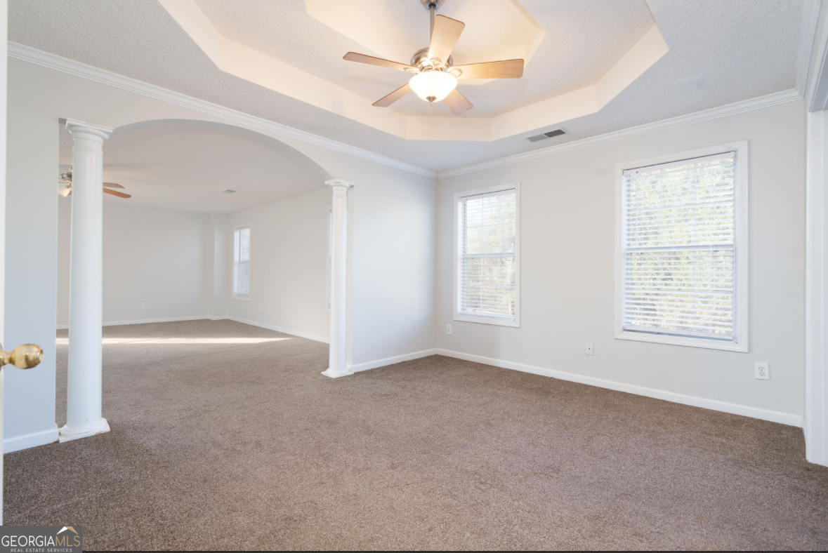 4414 Mitchells Ridge Drive Ellenwood, GA 30294 - Photo 12 of 25 a view of an empty room with a window