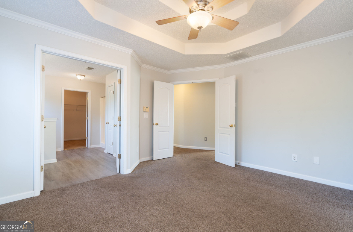 4414 Mitchells Ridge Drive Ellenwood, GA 30294 - Photo 13 of 25 an empty room with a bathroom