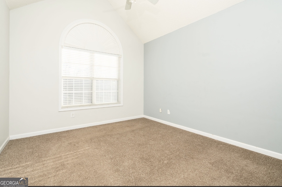 4414 Mitchells Ridge Drive Ellenwood, GA 30294 - Photo 19 of 25 an empty room with a window