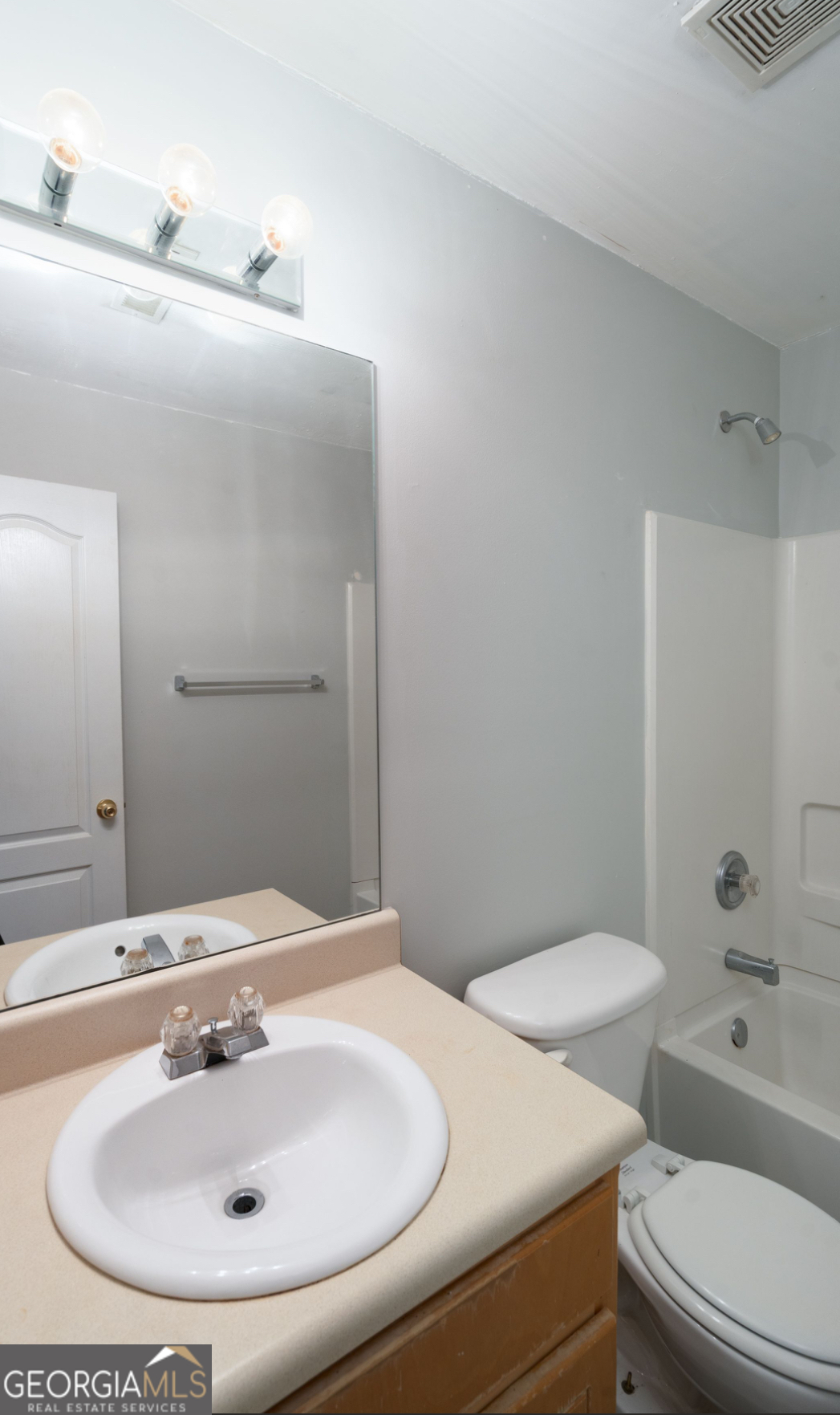 4414 Mitchells Ridge Drive Ellenwood, GA 30294 - Photo 21 of 25 a bathroom with a sink and a toilet
