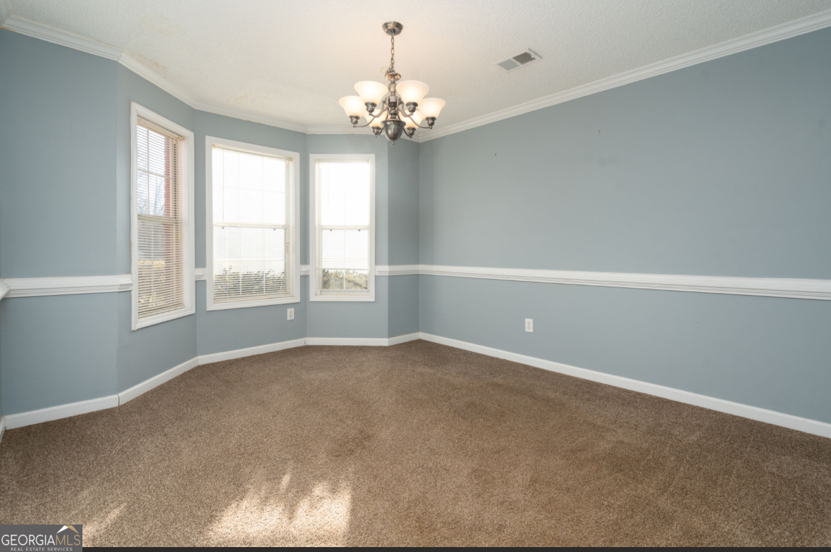 4414 Mitchells Ridge Drive Ellenwood, GA 30294 - Photo 3 of 25 a view of an empty room with a window