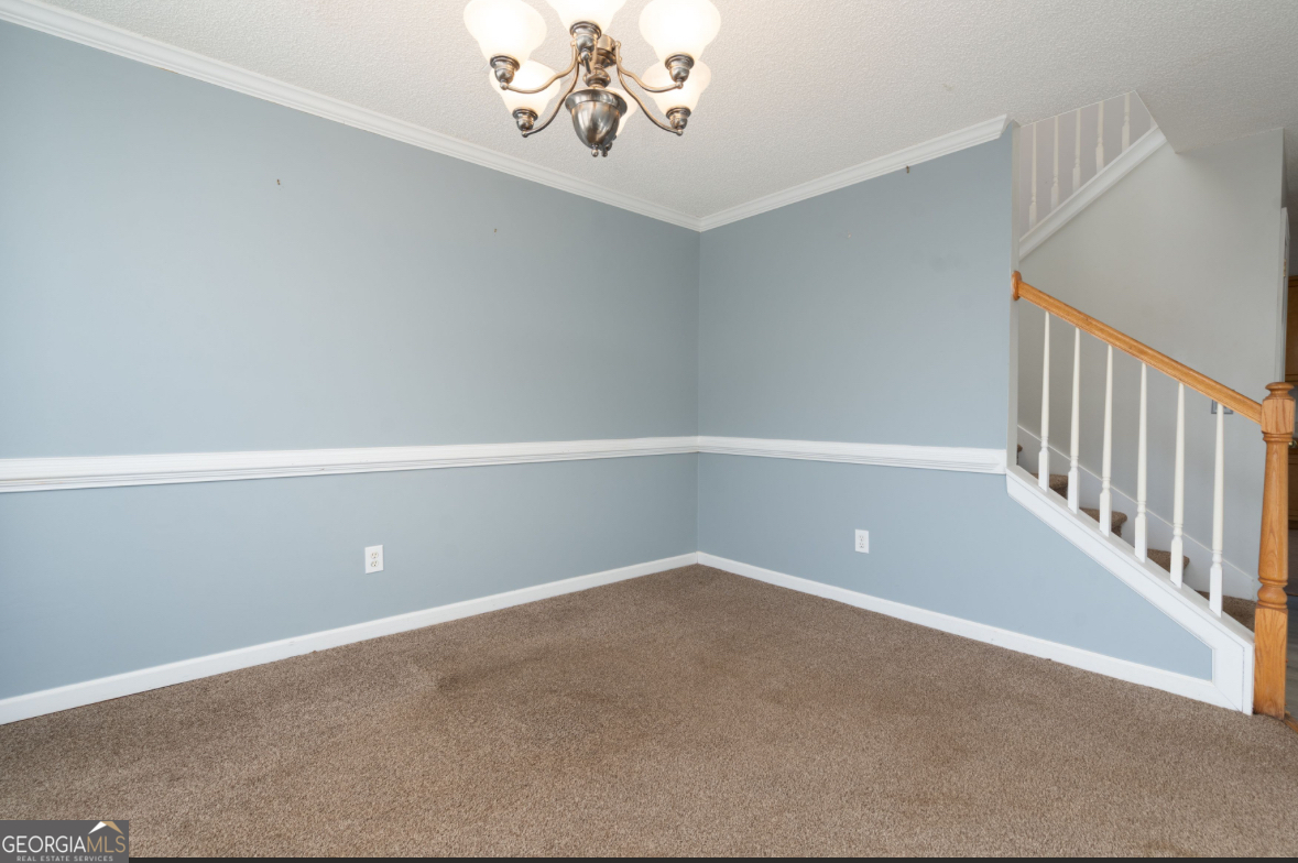 4414 Mitchells Ridge Drive Ellenwood, GA 30294 - Photo 4 of 25 a view of an empty room with a window