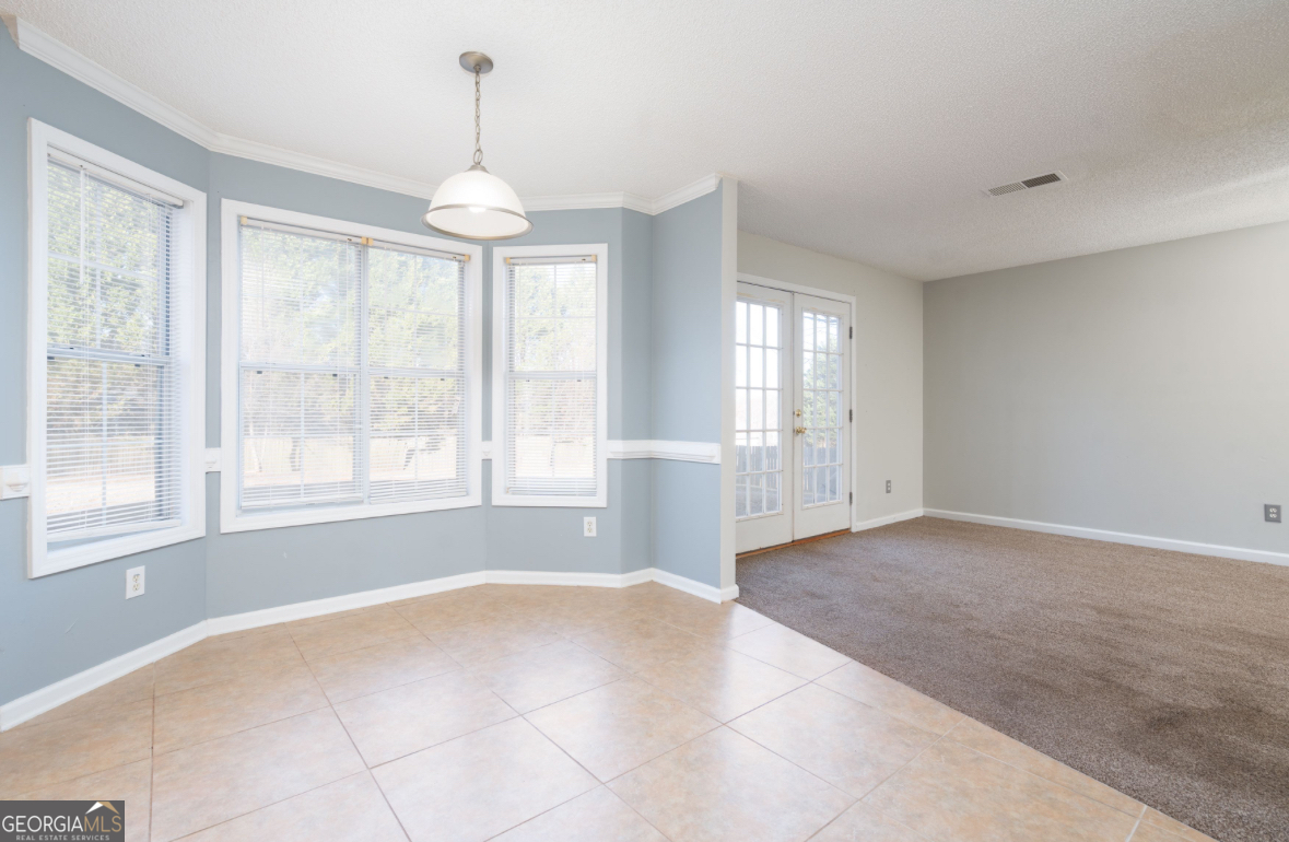 4414 Mitchells Ridge Drive Ellenwood, GA 30294 - Photo 7 of 25 a view of an empty room with a window