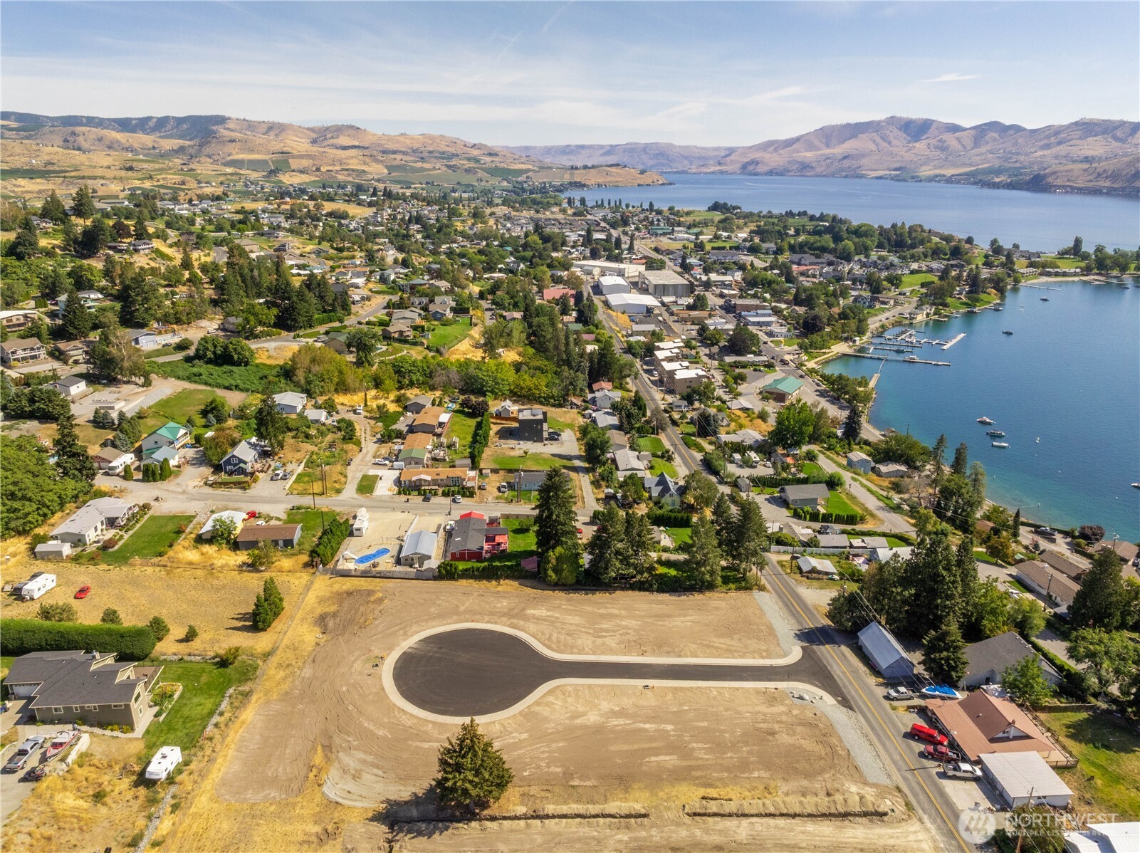 38 Indigo Lane Manson, WA 98831 - Photo 14 of 30 an aerial view of residential houses with outdoor space