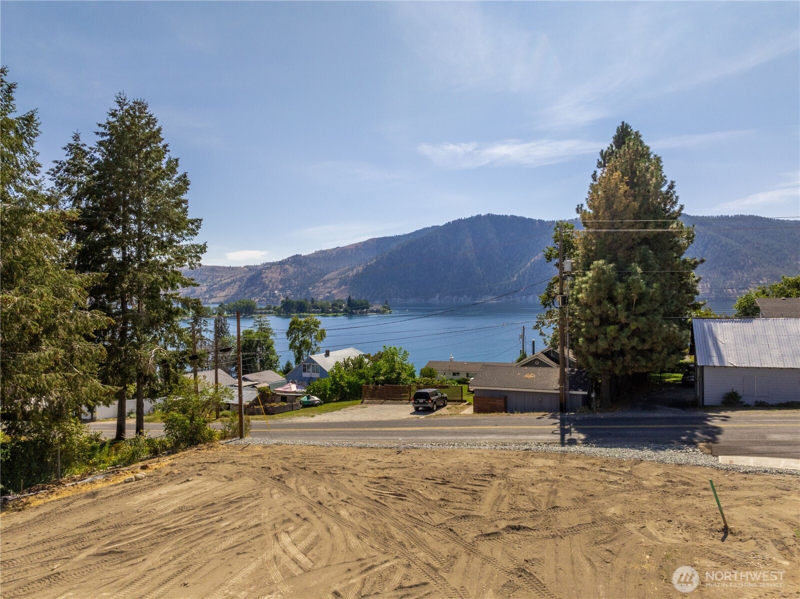 38 Indigo Lane Manson, WA 98831 - Photo 2 of 30 a view of houses with a street
