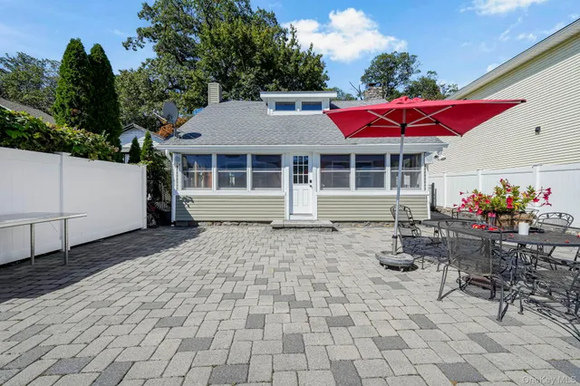 a view of a house with sitting area