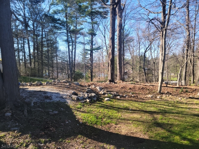 309 Wagon Wheel Road, Unit B Montague, NJ 07827 - Photo 13 of 13 a view of a house with a yard
