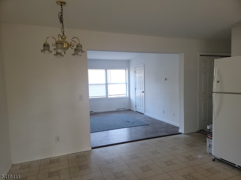 309 Wagon Wheel Road, Unit B Montague, NJ 07827 - Photo 6 of 13 a view of an empty room with a window