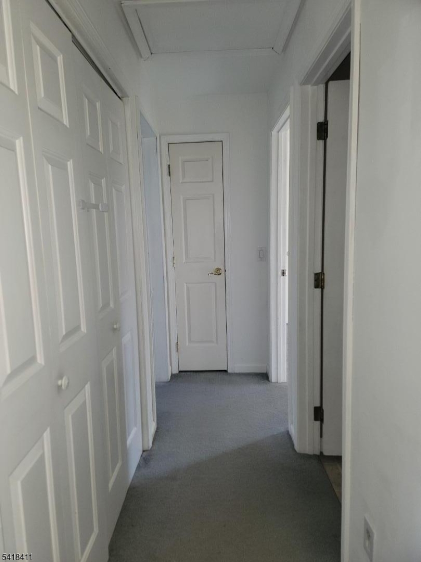 309 Wagon Wheel Road, Unit B Montague, NJ 07827 - Photo 8 of 13 a view of a hallway with closet area