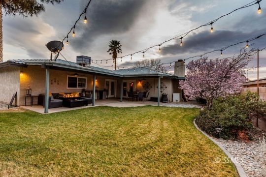 908 North Inyo Street Ridgecrest, CA 93555 - Photo 44 of 46 a view of a house with swimming pool and sitting area