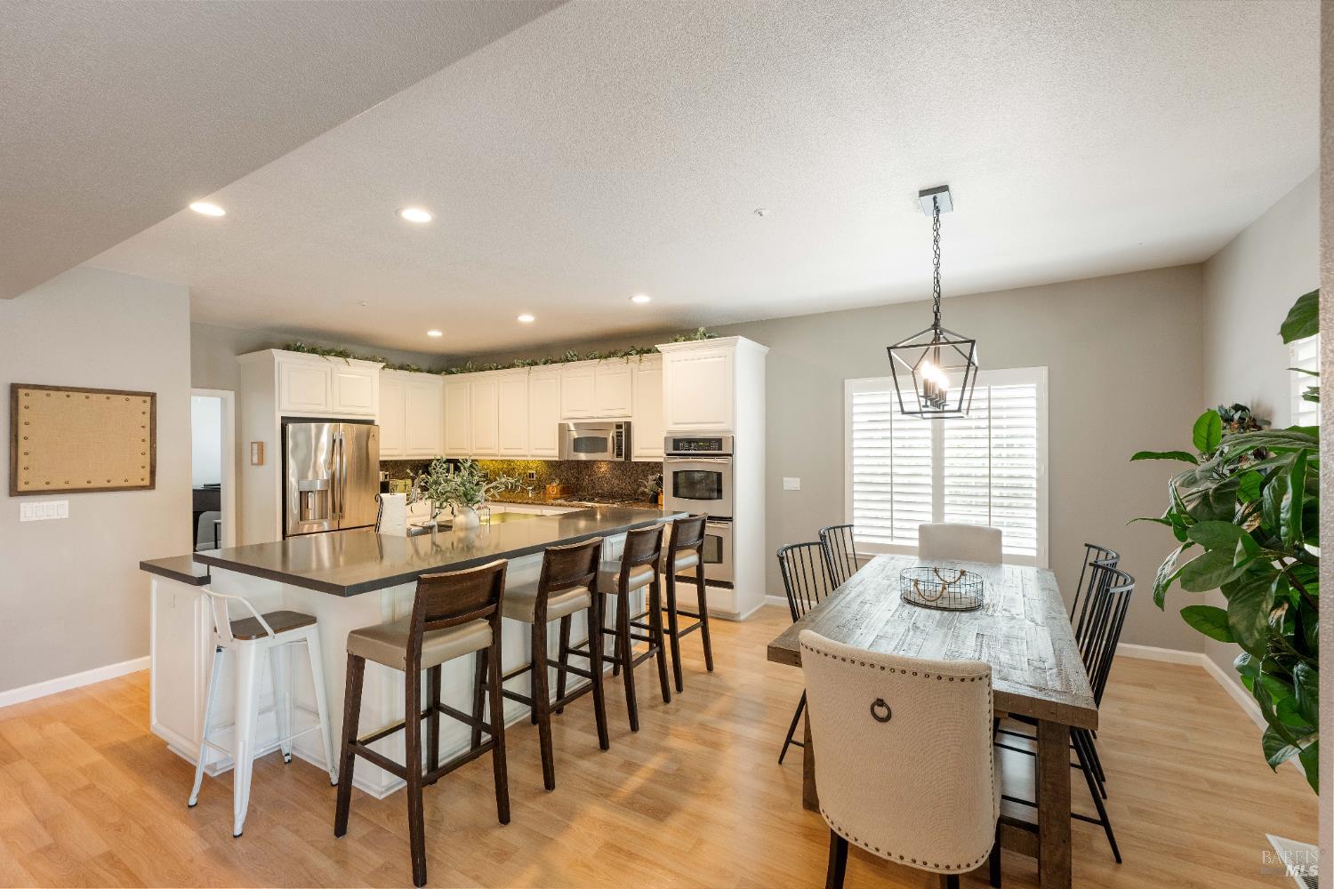 1238 Darling Street Napa, CA 94558 - Photo 18 of 68 a view of a dining room with furniture window and wooden floor