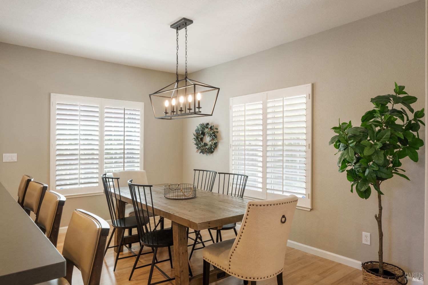 1238 Darling Street Napa, CA 94558 - Photo 19 of 68 a view of a dining room with furniture window and wooden floor