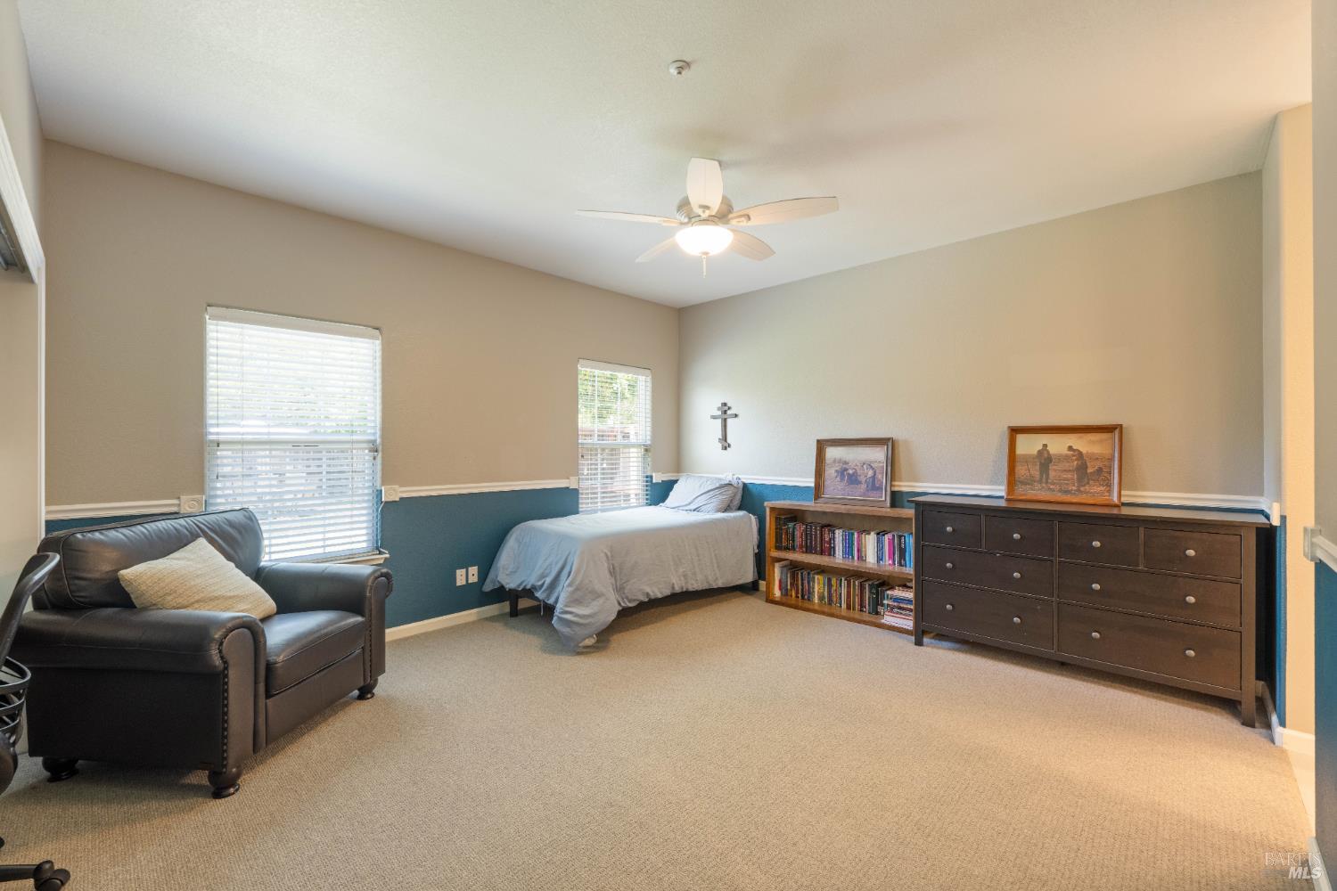 1238 Darling Street Napa, CA 94558 - Photo 24 of 68 a spacious bedroom with a bed and a couch