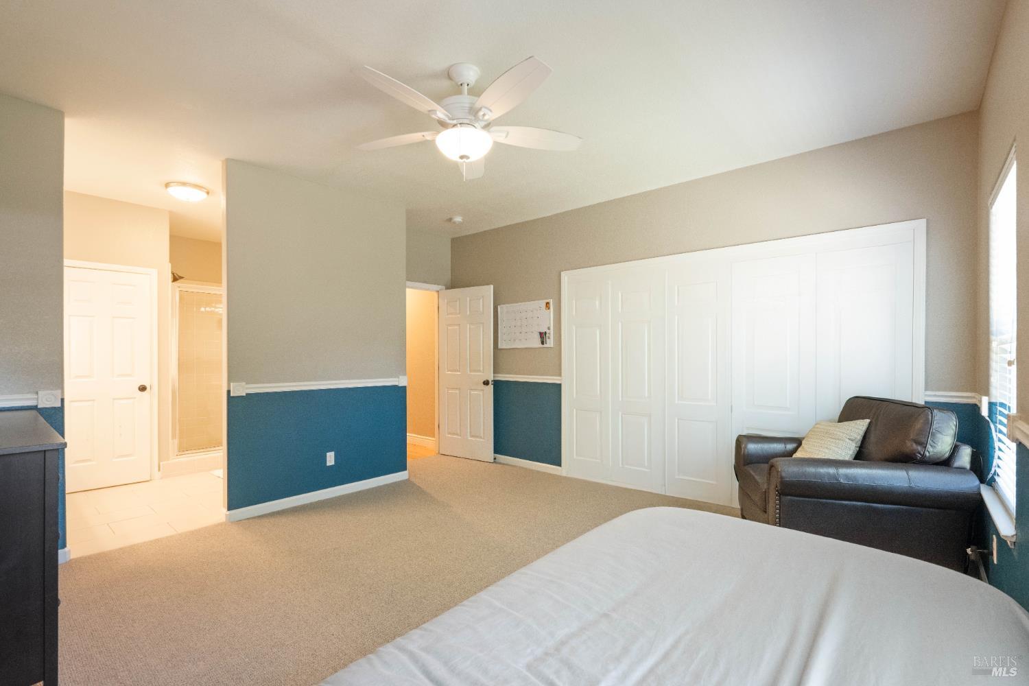 1238 Darling Street Napa, CA 94558 - Photo 26 of 68 a bedroom with a bed and a mirror