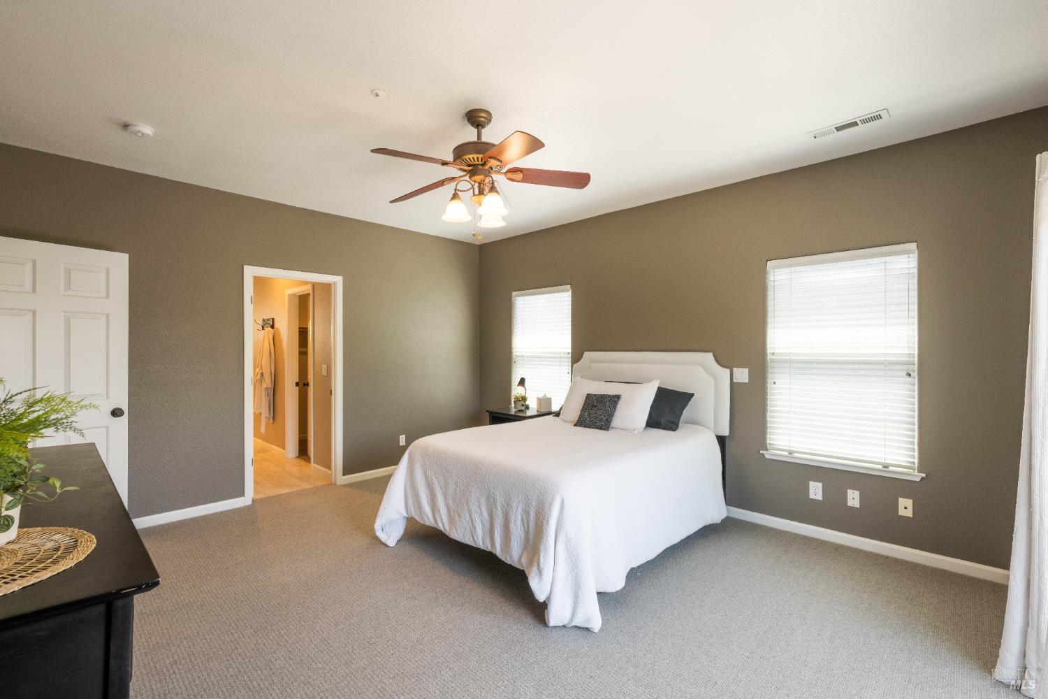 1238 Darling Street Napa, CA 94558 - Photo 48 of 68 a bedroom with a bed chandelier and a window