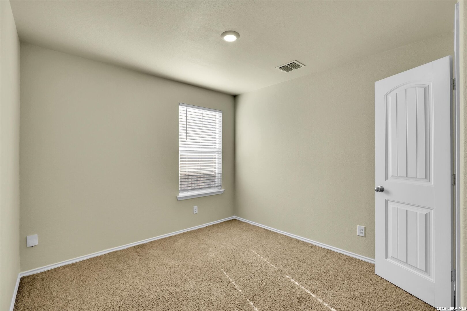 7639 Hercules Point San Antonio, TX 78252 - Photo 26 of 28 an empty room with a window