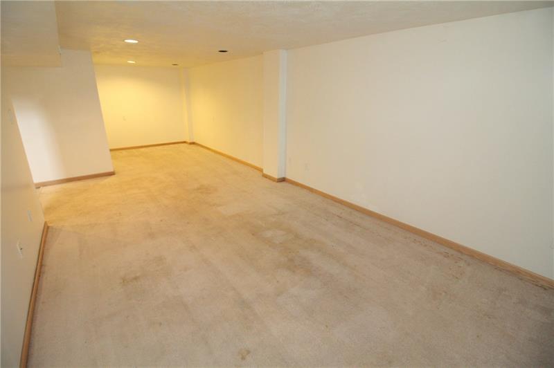 166 Francis Road Pittsburgh, PA 15239 - Photo 13 of 22 The game/family room on the lower level is spacious and provides all kinds of possibilities for entertaining family and friends!