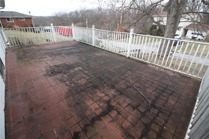 166 Francis Road Pittsburgh, PA 15239 - Photo 17 of 22 The tiled deck needs a little TLC and will be a great feature for this home!