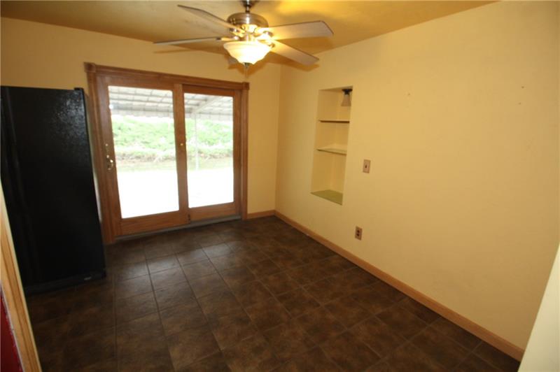 166 Francis Road Pittsburgh, PA 15239 - Photo 8 of 22 The layout of the kitchen and the dining room allow for a large table and chairs...