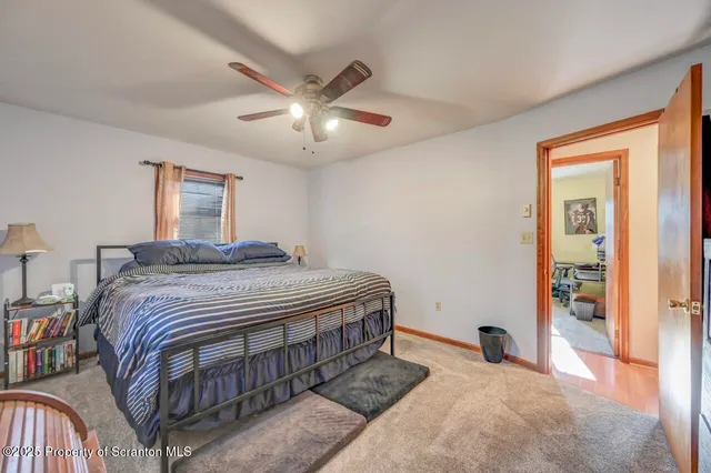 a bathroom with a shower and a sink